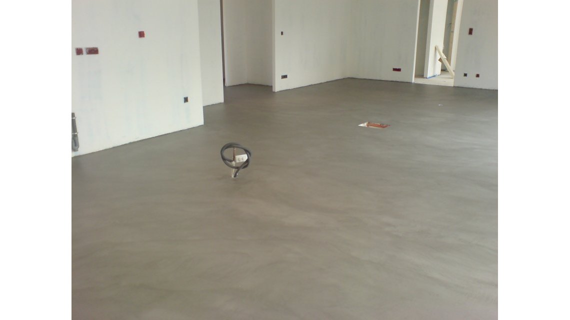 Sol en béton ciré  <p>Sol en béton ciré gris</p>