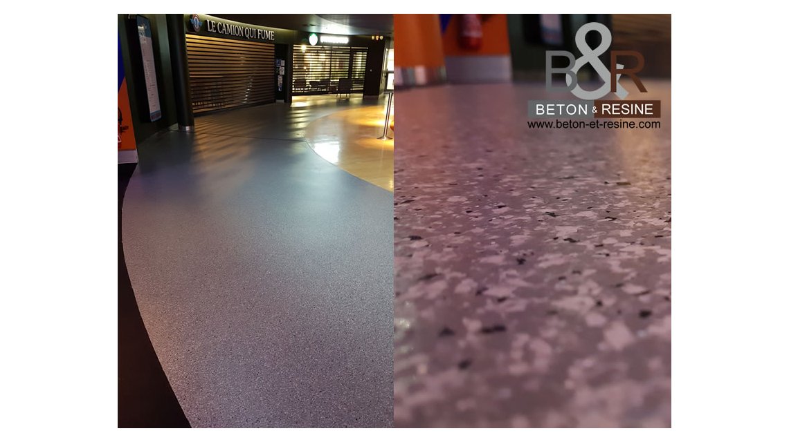 Chantier réalisé au cinéma Pathé Gaumont “Quai d'Ivry”, la moquette a été remplacée par une résine avec paillette (ou chips) pour donner un effet terrazzo tout en permettant un entretien aisé. Ce sol présente une très forte résistance mécanique Le chantier a été réalisé de nuit avec des résines méthacrylate afin de redonner l'exploitation dès le lendemain matin.  