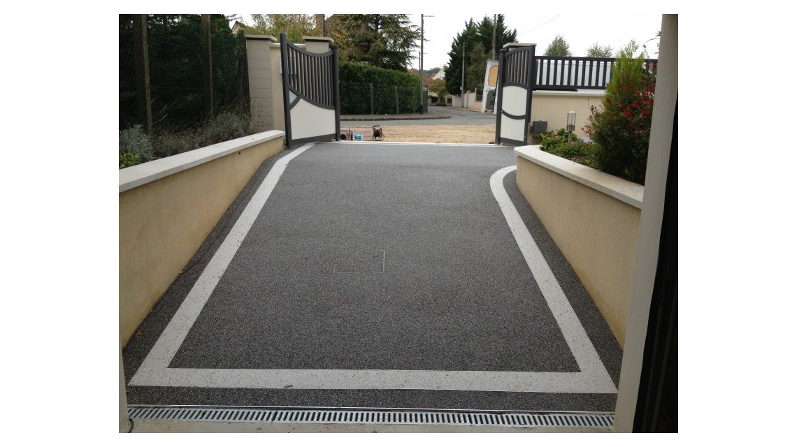 Descente de garage en tapis de marbre  